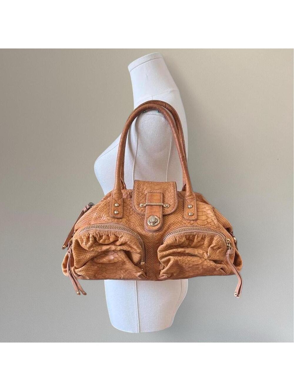Botkier snakeskin embossed leather purse.